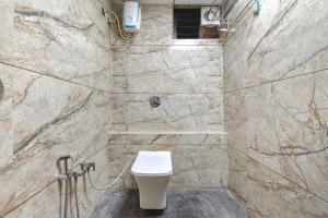 Koupelna v ubytování FabHotel Max Inn