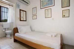 Postel nebo postele na pokoji v ubytování Heaven's Resort