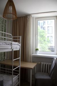 Posteľ alebo postele v izbe v ubytovaní oompH Warsaw Central Apartment