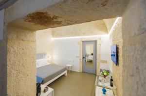 Postel nebo postele na pokoji v ubytování Murr Luxury Rooms + 37 fotografií