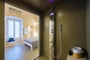 Postel nebo postele na pokoji v ubytování Murr Luxury Rooms