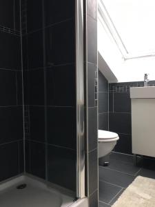 Koupelna v ubytování WUNDERBAR. Über den Dächern