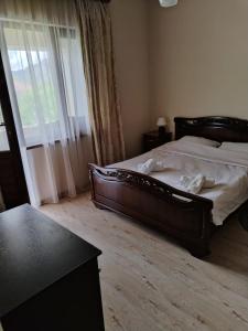 Postel nebo postele na pokoji v ubytování Garni Guesthouse