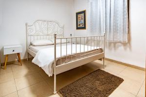 Postel nebo postele na pokoji v ubytování Nof glili Mansion + 37 fotografií