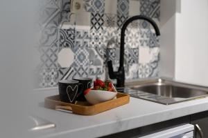 Kuchyň nebo kuchyňský kout v ubytování Apartments Orlic + 37 fotografií