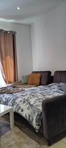 Posteľ alebo postele v izbe v ubytovaní DOGA Bel appartement 1er étage 4 personnes bebe