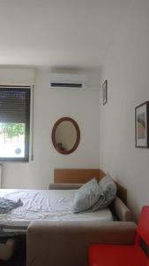 A bed or beds in a room at Senza Pensieri via Viviani