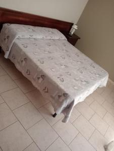 Postel nebo postele na pokoji v ubytování B&b De Mauro