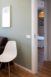 Uma cama ou camas num quarto em Appartamento Nautilus
