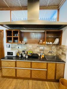 Cucina o angolo cottura di Pinewood cottages