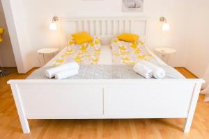 Postel nebo postele na pokoji v ubytování Studio-Appartements Emwey