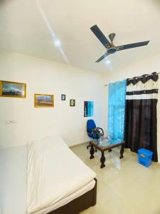 Katil atau katil-katil dalam bilik di Pall Residency