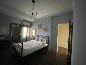Posteľ alebo postele v izbe v ubytovaní 臺南安平 -安平安逸民宿 Anping Guest House