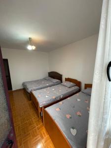 Postel nebo postele na pokoji v ubytování Nana's Rooms
