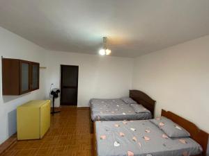 Postel nebo postele na pokoji v ubytování Nana's Rooms + 6 fotografií