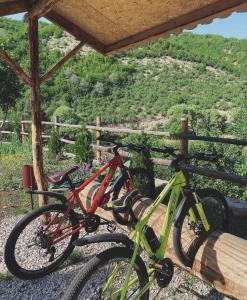 two bikes parked next to each other on a porch at Hovek Guest House in Dilijan