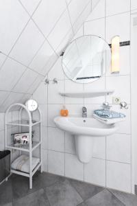 Ένα μπάνιο στο Ferienwohnung im Haus Weinstock