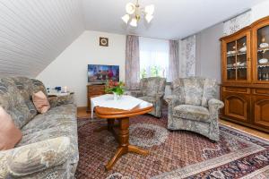 Χώρος καθιστικού στο Ferienwohnung im Haus Weinstock
