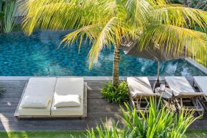 Bazén v ubytování MASMARA Resort Canggu nebo v jeho okolí