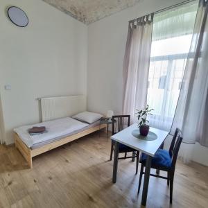 Postel nebo postele na pokoji v ubytování Apartment Porta + 37 fotografií