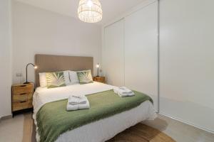 Posteľ alebo postele v izbe v ubytovaní Apartamento Chacolina Las Canteras