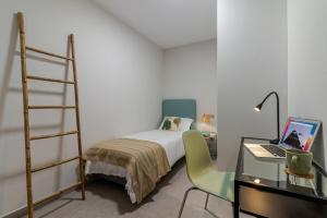Posteľ alebo postele v izbe v ubytovaní Apartamento Chacolina Las Canteras