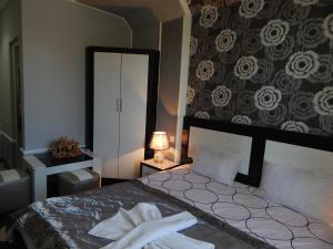 Postel nebo postele na pokoji v ubytování B&B Europa Hotel