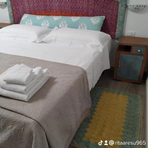 Ένα ή περισσότερα κρεβάτια σε δωμάτιο στο B&B SA CROBE
