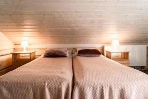 Postel nebo postele na pokoji v ubytování Meretuule Holiday Home