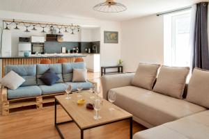 Area soggiorno di À 100m du port de Loctudy, bel appartement pour 6