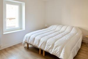 Postel nebo postele na pokoji v ubytování À 100m du port de Loctudy, bel appartement pour 6