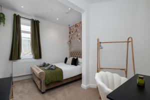 Postel nebo postele na pokoji v ubytování Finest Retreats - Peace Retreats Apartment, Pwllheli