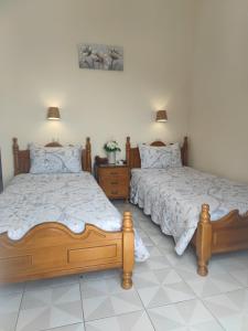 Postel nebo postele na pokoji v ubytování Hotel Anagennisis