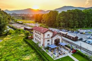 an aerial view of a train station at sunset at SMART San Martino in Paratico