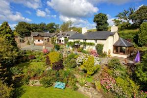 an aerial view of a house with a garden at Barley Cottage - 5* Cyfie Farm with log burner and private covered hot tub in Llanfyllin