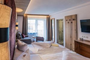 Katil atau katil-katil dalam bilik di Hotel Föhrenhof