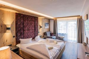 Katil atau katil-katil dalam bilik di Hotel Föhrenhof