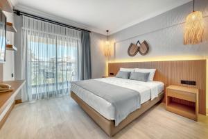 Postel nebo postele na pokoji v ubytování Hildegard Hotel