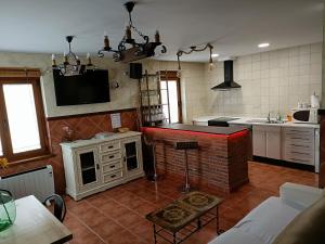 A kitchen or kitchenette at VuT Casa Fabe12 Még 12 kép