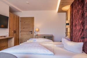 Katil atau katil-katil dalam bilik di Hotel Föhrenhof