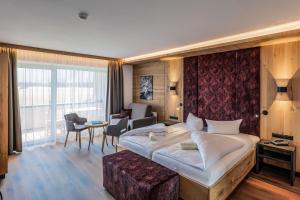 Katil atau katil-katil dalam bilik di Hotel Föhrenhof