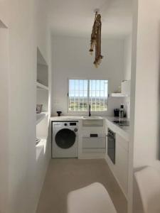 A kitchen or kitchenette at Exclusivo cortijo con piscina privada