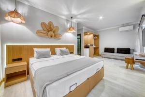 Postel nebo postele na pokoji v ubytování Hildegard Hotel