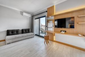 TV a/nebo společenská místnost v ubytování Hildegard Hotel