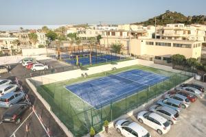 an overhead view of a tennis court in a parking lot at Porto Platanias Beach Resort & Spa in Plataniás