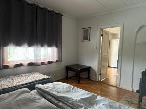 En eller flere senger på et rom på Oslo House, Nedre Kjellerstuvei, First floor, Twin Room