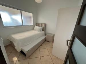 Letto o letti in una camera di Piso céntrico y a pie de playa.