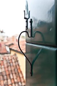 a close up of a metal door with a wire at Corte Stupenda in Venice