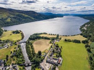 an aerial view of a large body of water at Dunalastair Hotel Suites in Kinloch Rannoch