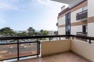 a balcony with a view of a city at Cascais by the Sea in Estoril